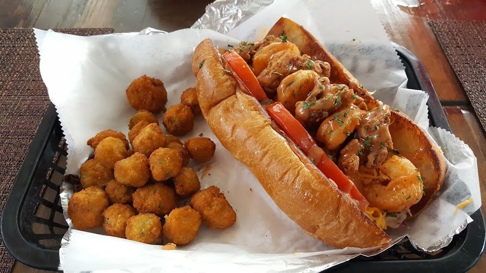 Seafood menu featuring salads, dinners, and small plates.