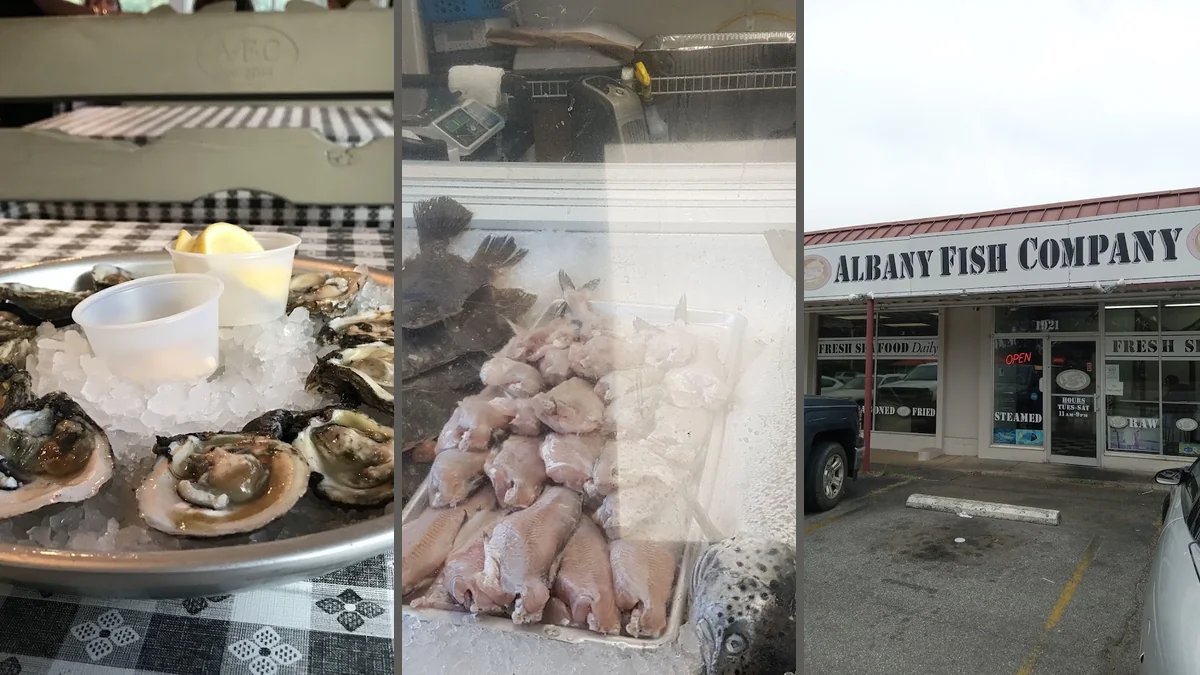 Seafood dishes served in a warm, lively dining room.